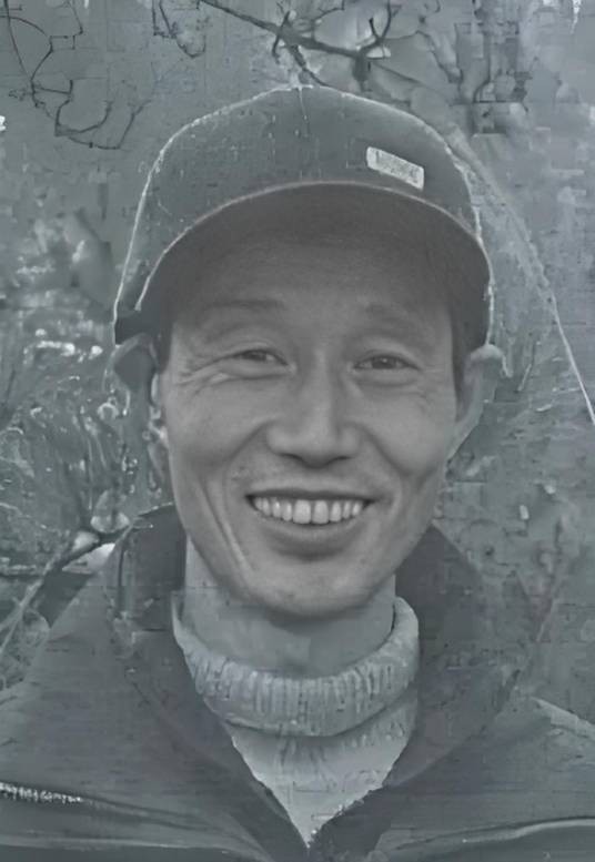 覃昌年